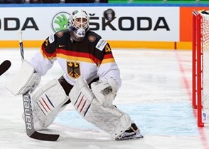 PRAGUE, CZECH REPUBLIC - MAY 3: Germany's Dennis Endras #44 spots a puck in mid-air during preliminary round action against Canada at the 2015 IIHF Ice Hockey World Championship. (Photo by Andre Ringuette/HHOF-IIHF Images)

