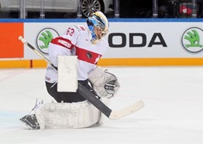 PRAGUE, CZECH REPUBLIC - MAY 3: Switzerland's Leonardo Genoni #63 makes the save during preliminary round action against France at the 2015 IIHF Ice Hockey World Championship. (Photo by Andre Ringuette/HHOF-IIHF Images)

